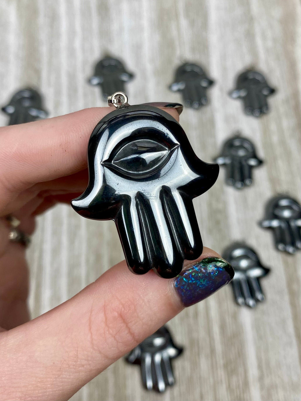 Hematite Hamsa Pendant Curious Muse Crystals