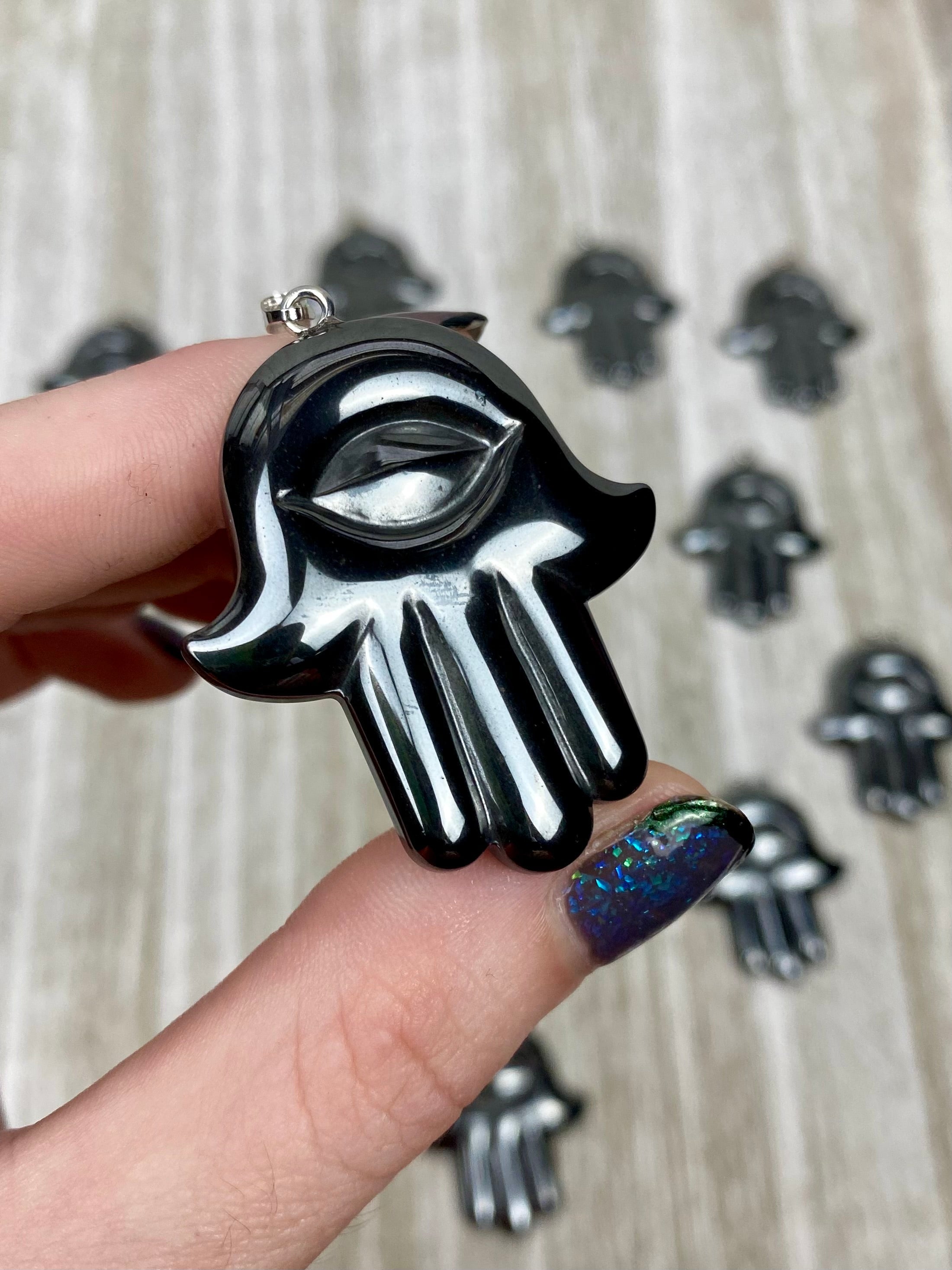 Hematite Hamsa Pendant Curious Muse Crystals