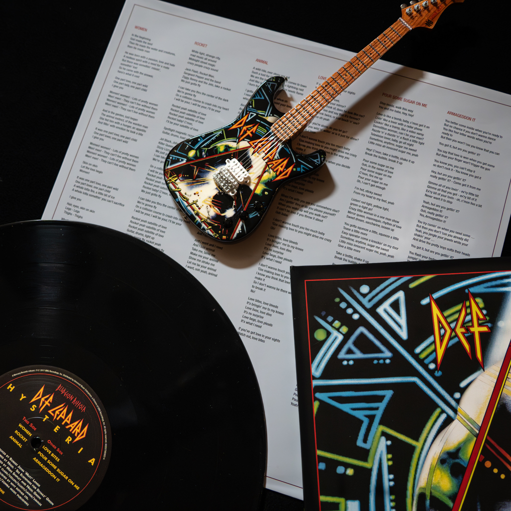 Def Leppard’s “Hysteria” Collectible Miniature Guitar The Mini Axe