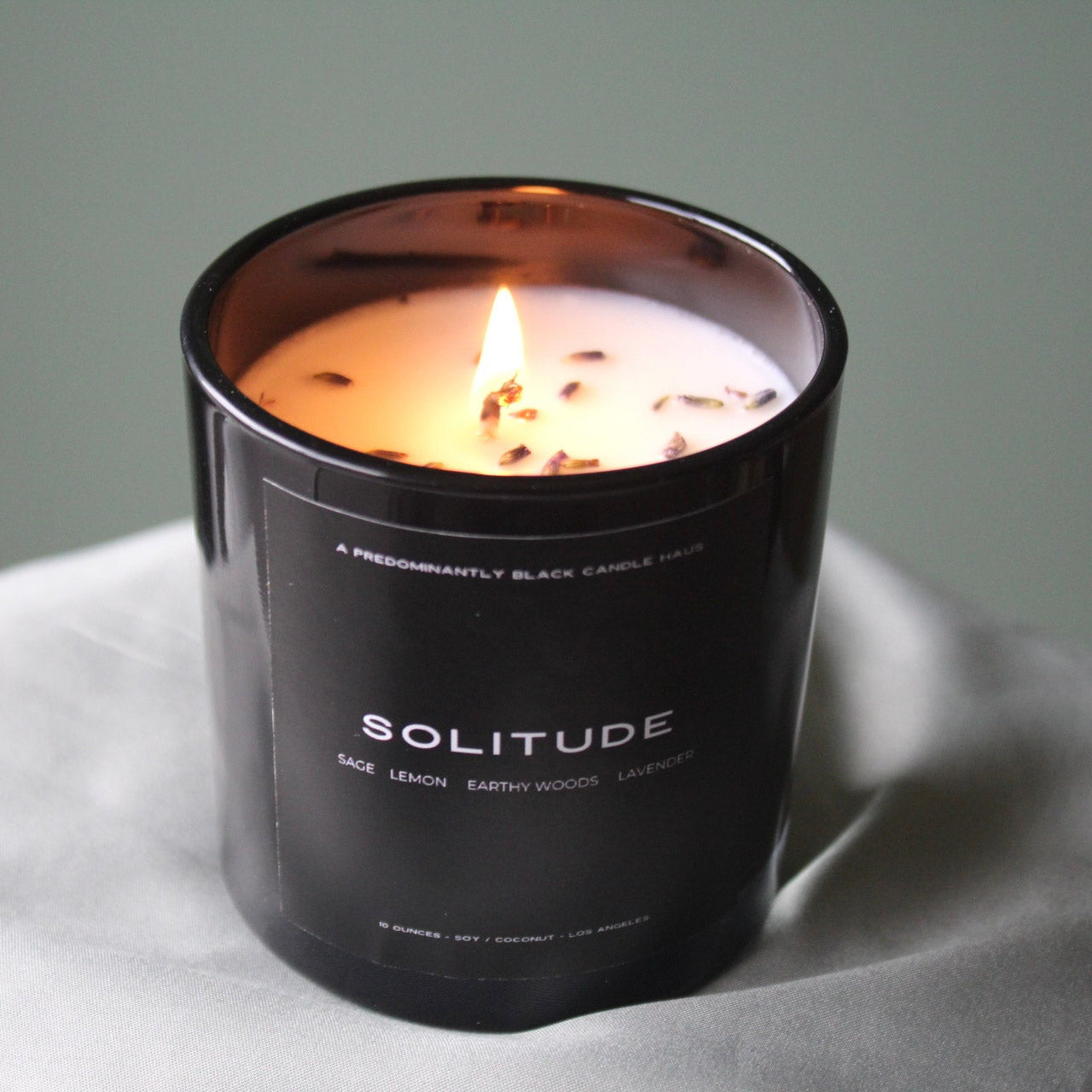 A SOLITUDE CANDLE Predominantly Black