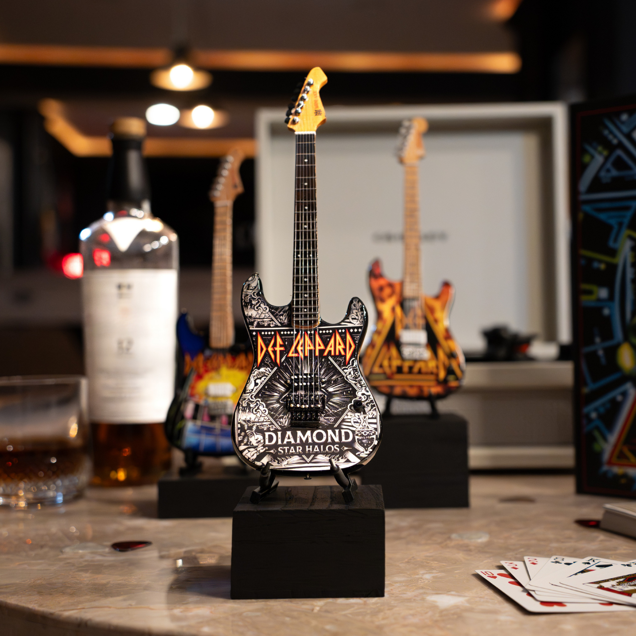 Def Leppard’s “Diamond Rejoice" and "Hysteria” Miniature Guitar Set The Mini Axe