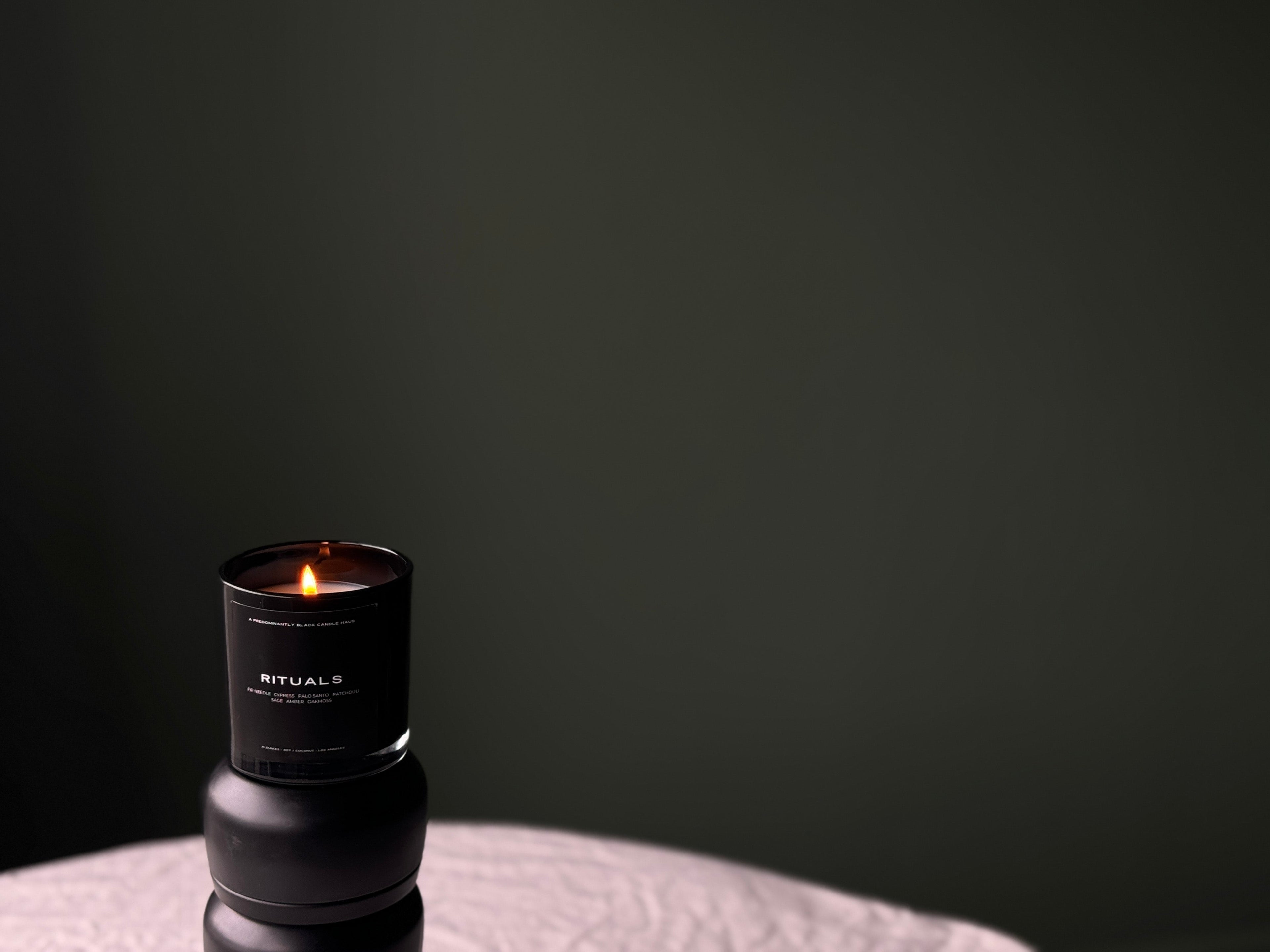 A RITUALS CANDLE Predominantly Black