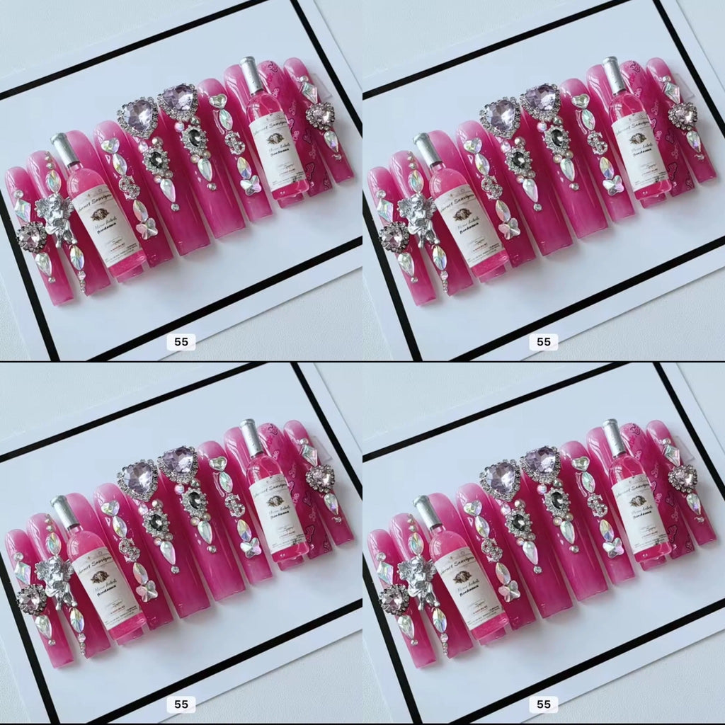 Pink acrylic press on nails with champagne HOL stores