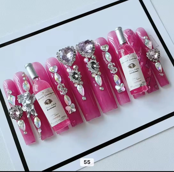 Pink acrylic press on nails with champagne HOL stores