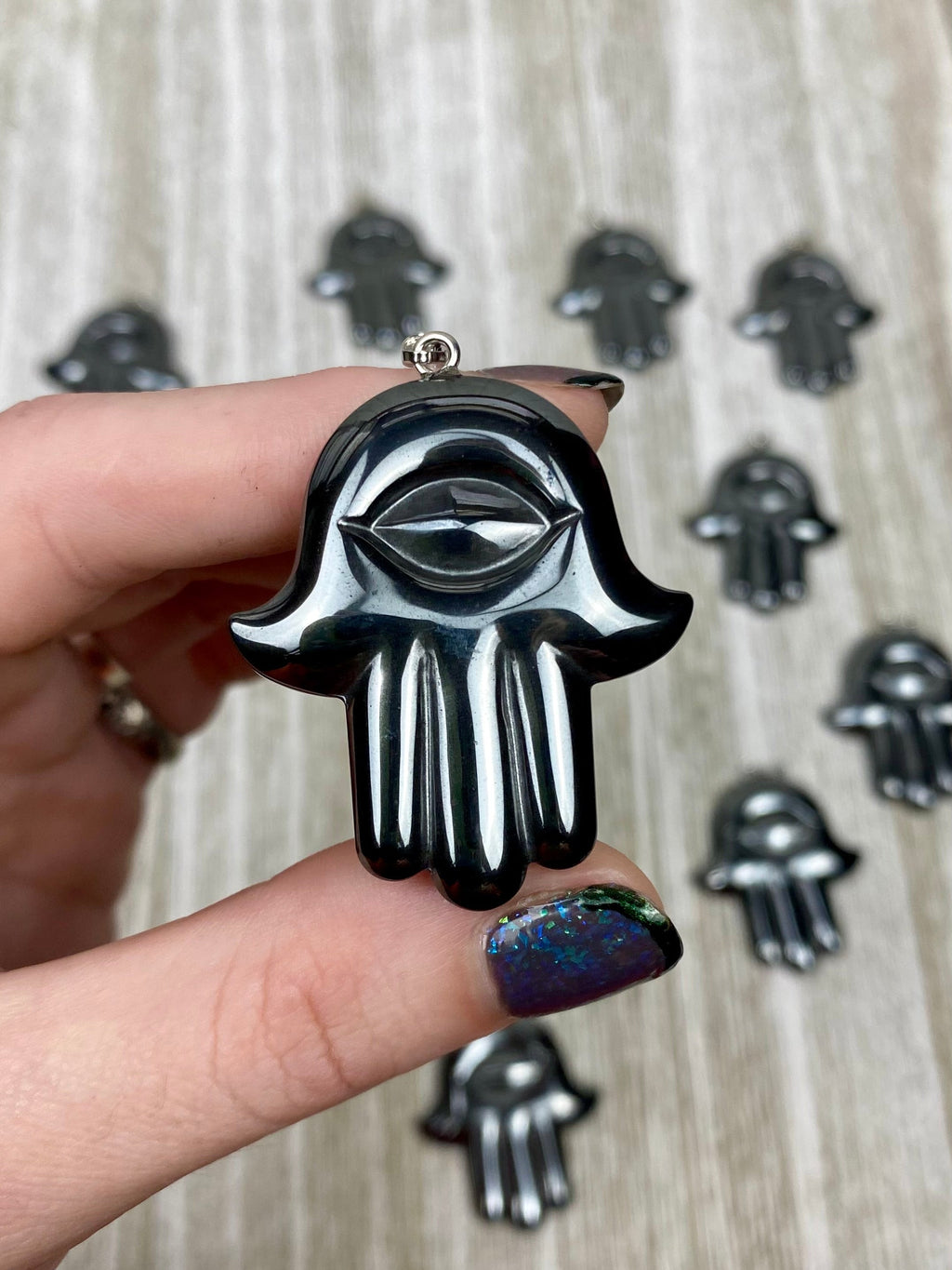 Hematite Hamsa Pendant Curious Muse Crystals
