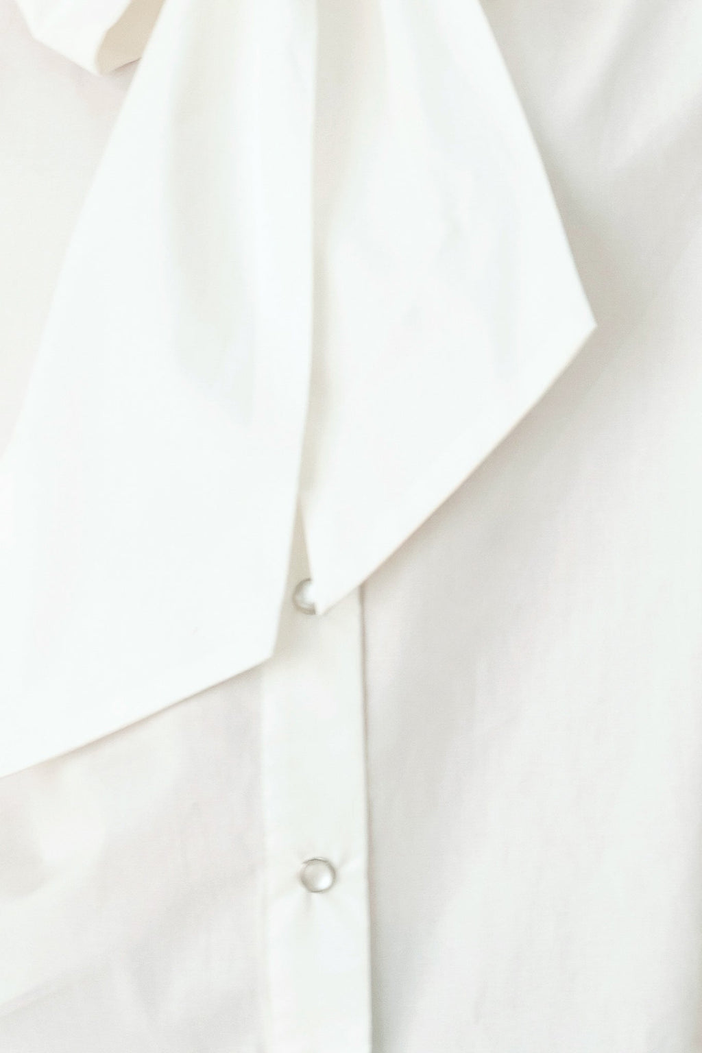 MODERN STATEMENT BOW WOVEN TOP Flying Tomato