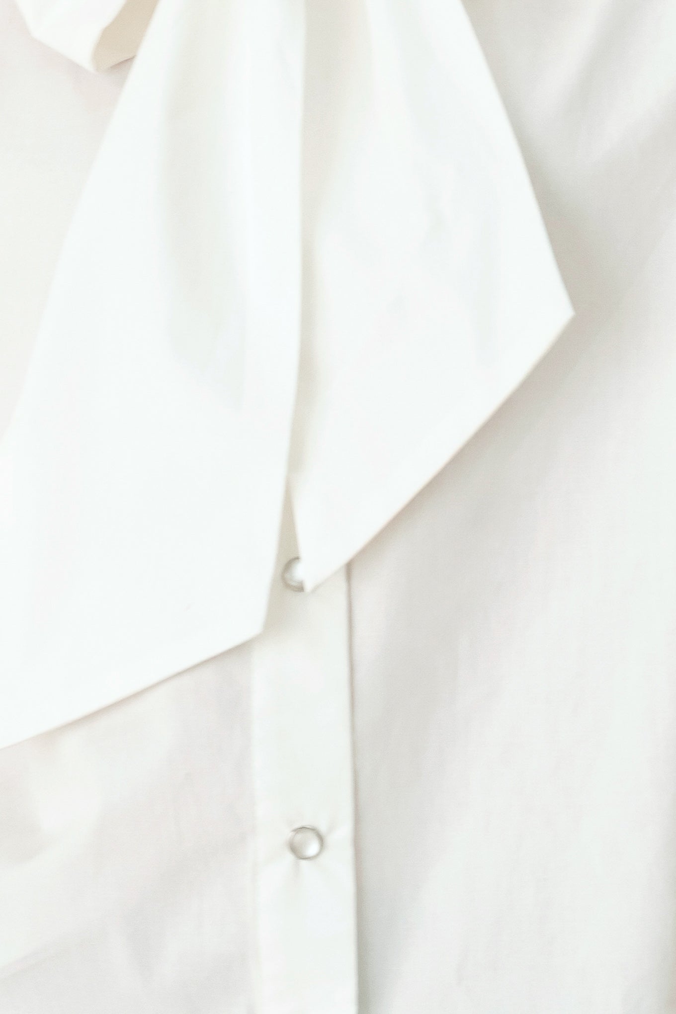 MODERN STATEMENT BOW WOVEN TOP Flying Tomato