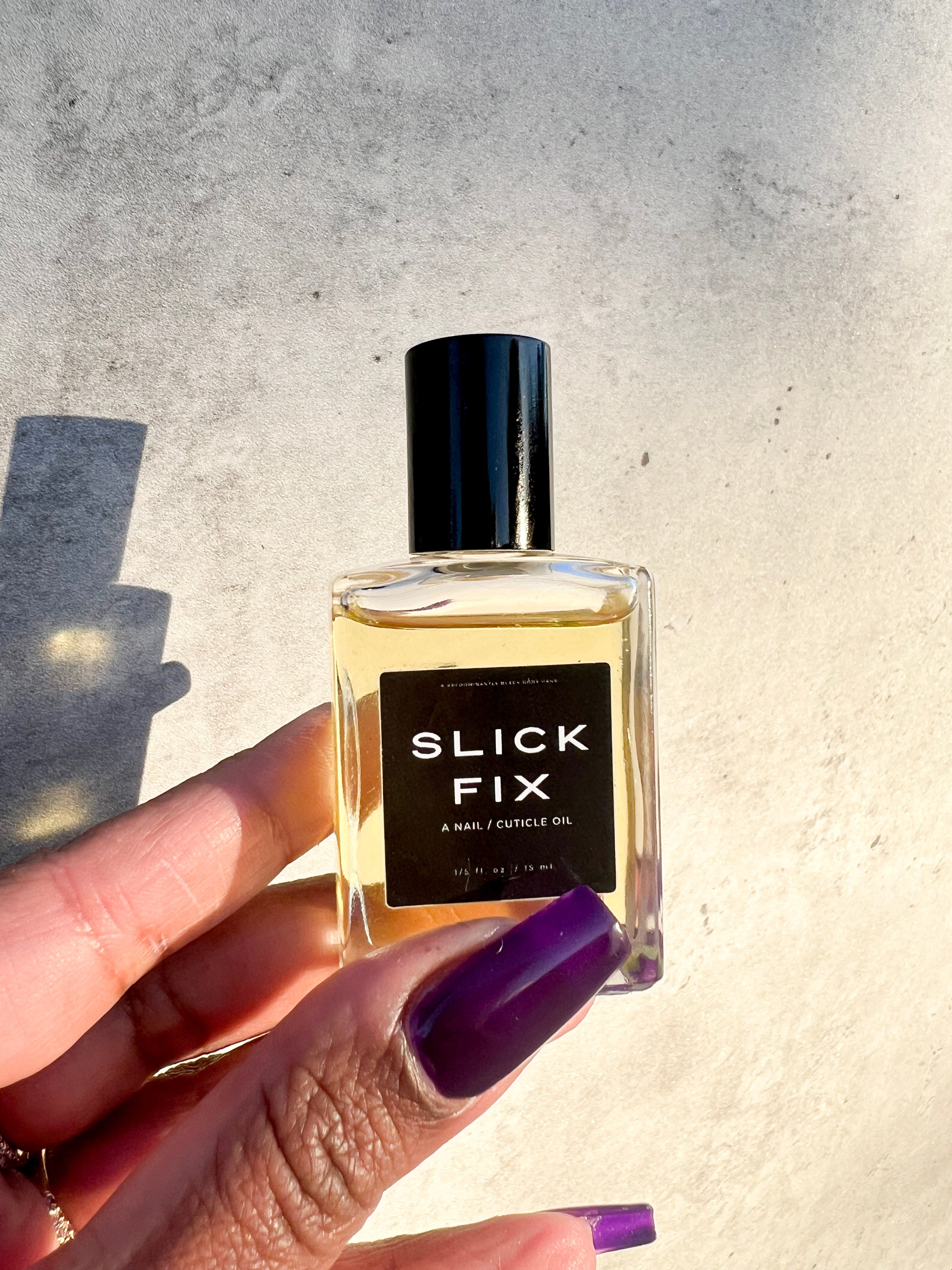 SLICK FIX, A NAIL / CUTICLE OIL Predominantly Black