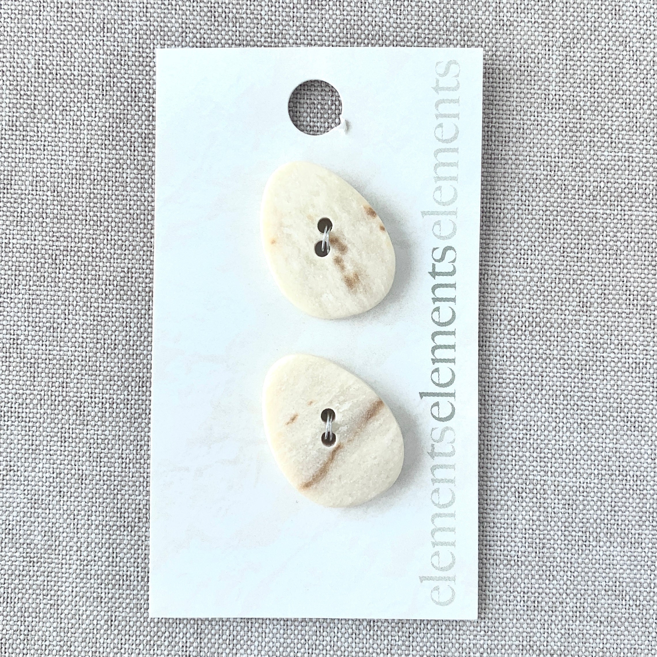 2904 Ivory Stone - Elements Elements Elements - 2 Holes - 25mm - Cream The Attic Exchange
