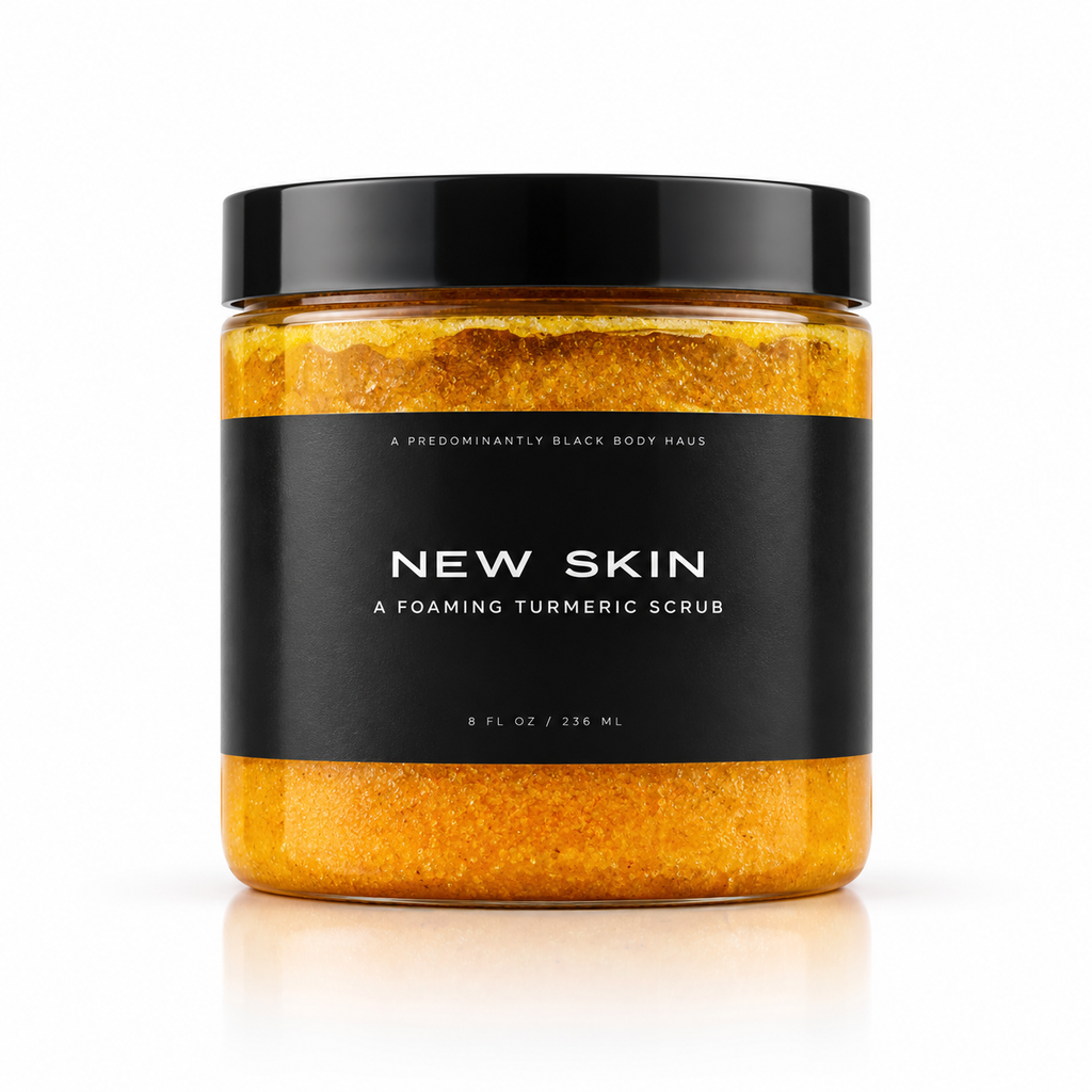 NEW SKIN, A FOAMING TURMERIC SCRUB Predominantly Black