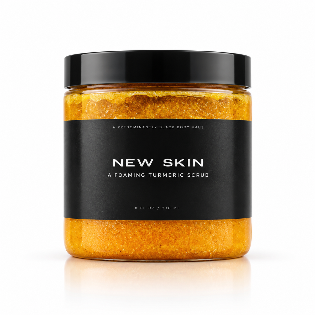 NEW SKIN, A FOAMING TURMERIC SCRUB Predominantly Black