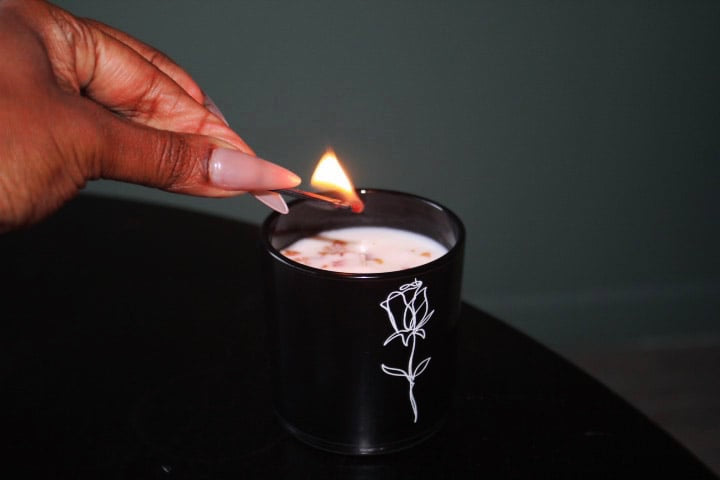 AN OPULENCE CANDLE Predominantly Black