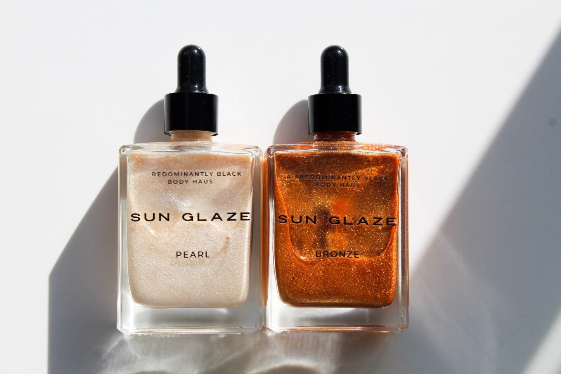 SUN GLAZE, A SHIMMER OIL Predominantly Black