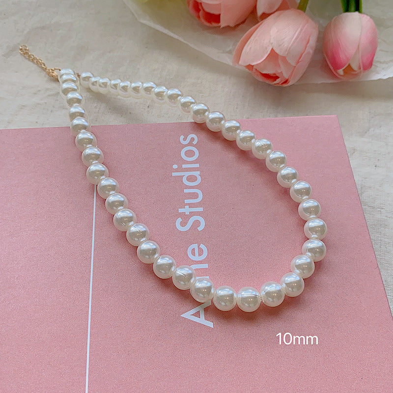 French lazy pearl necklace female niche high-end temperament versatile clavicle chain 2024 new sweater necklace