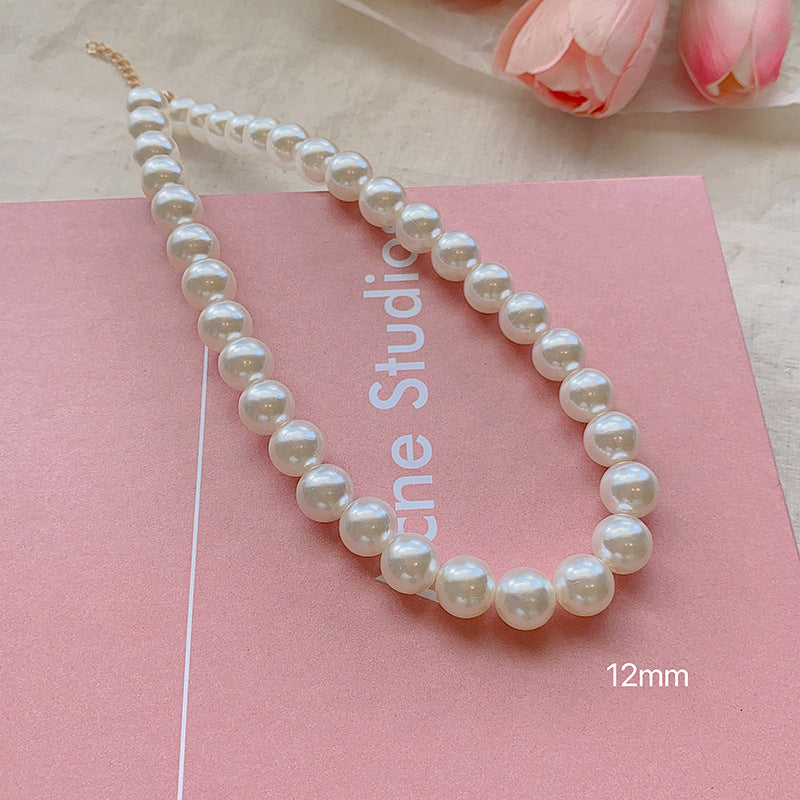 French lazy pearl necklace female niche high-end temperament versatile clavicle chain 2024 new sweater necklace