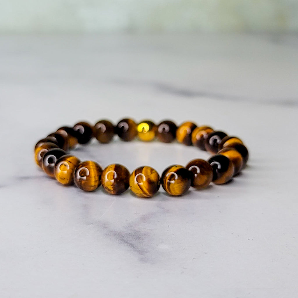 Tigers Eye Wrist Wear Adorned In Taji