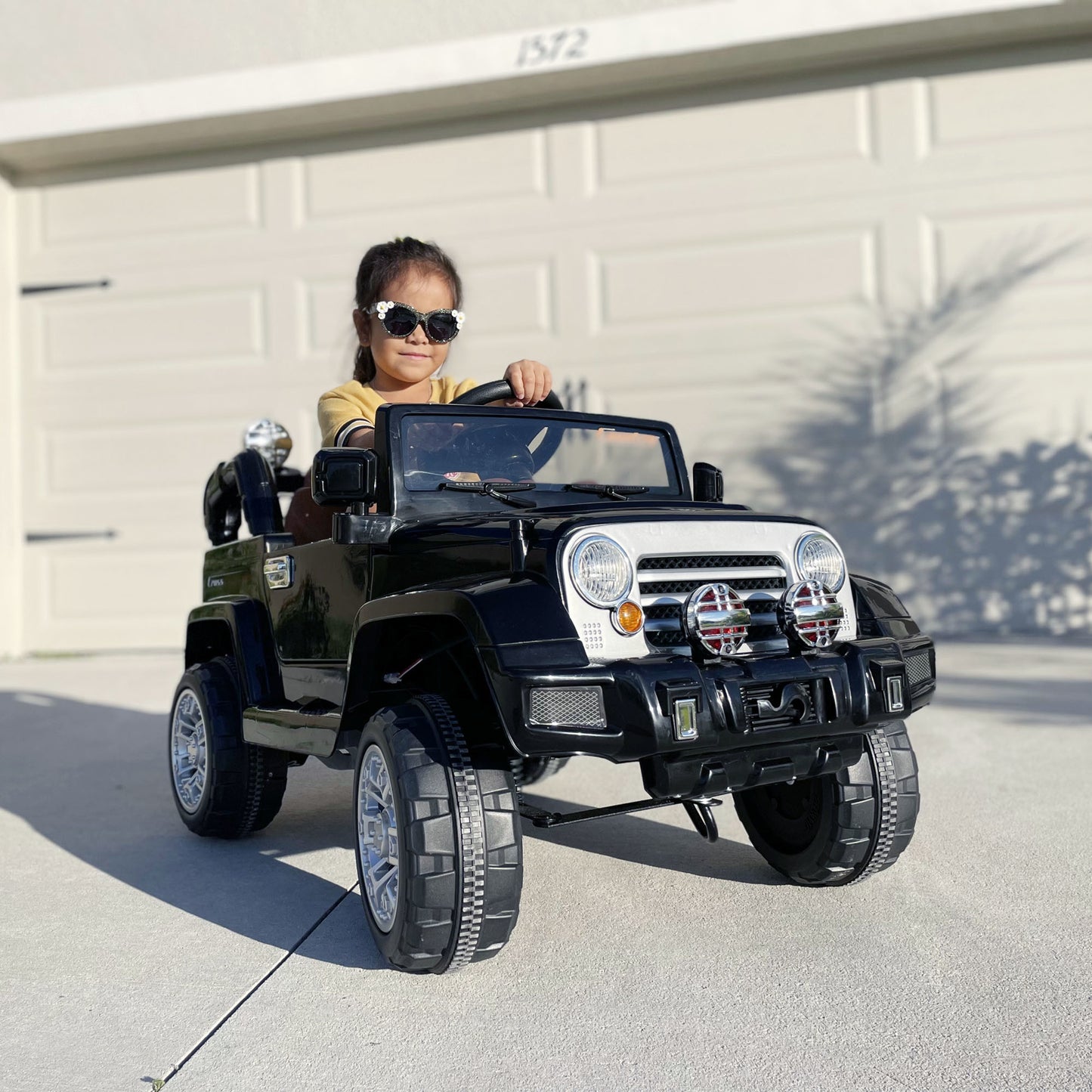 Kids Ride-on Car, Off-Road Truck with MP3 Connection, Working Horn, Steering Wheel, and Remote Control, 12V Motor, Black