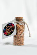 Glass Bottle Filled with Shavings and Sawdust from the Original 1969 Woodstock Stage Wood Peace Of Stage LLC