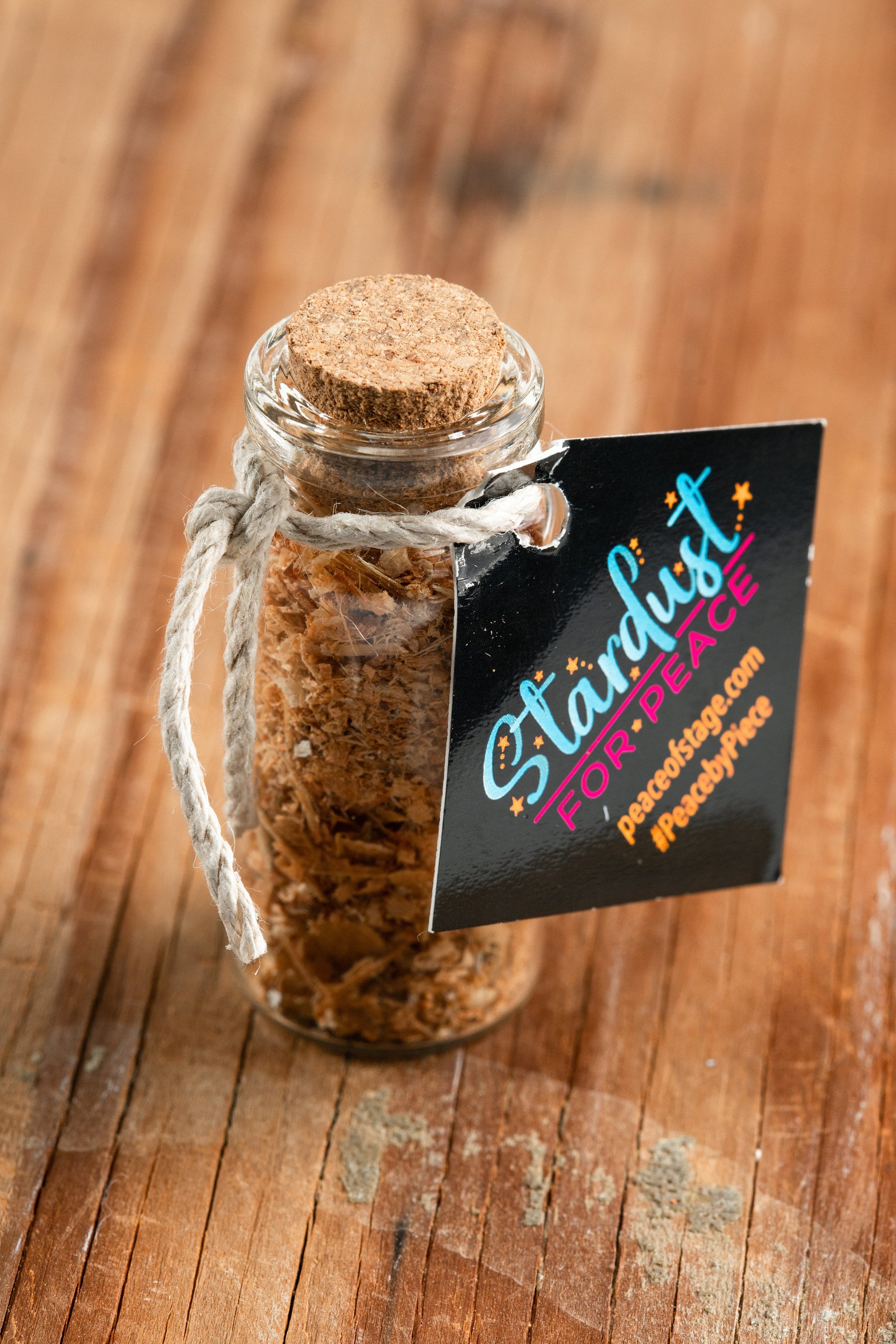 Glass Bottle Filled with Shavings and Sawdust from the Original 1969 Woodstock Stage Wood Peace Of Stage LLC