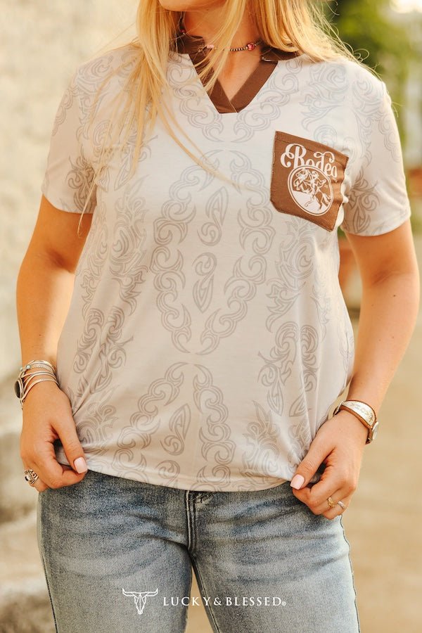 "Ivory Brown Boot Stitch Rodeo" Western Printed Stretch Top — Allover Boot Stitch with Contrast Pocket & V-Neck Cowhide and Conchos