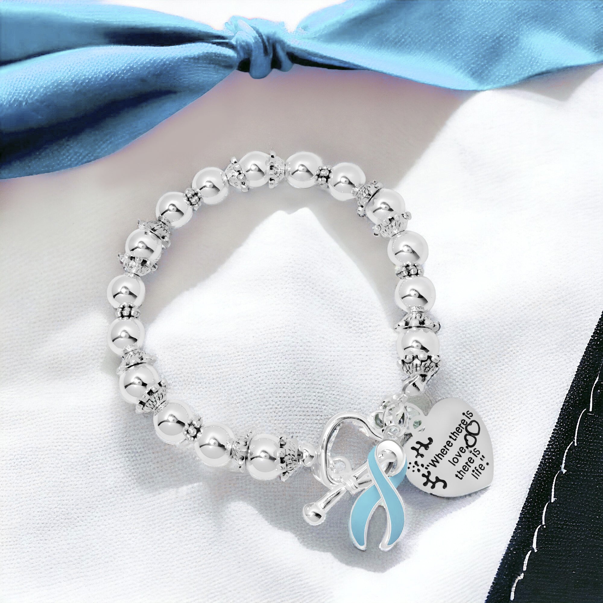 Light Blue Ribbon Where There is Love Bracelets The Awareness Company