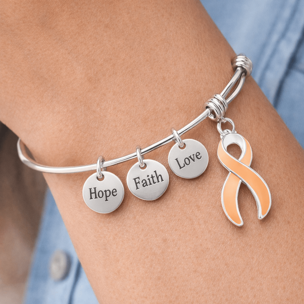 Peach Ribbon Retractable Charm Bracelets The Awareness Company