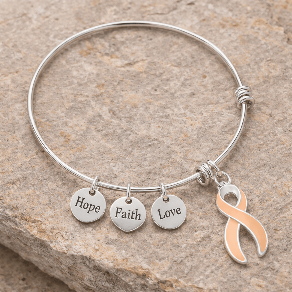 Peach Ribbon Retractable Charm Bracelets The Awareness Company