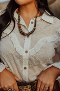 Turquoise Haven "Prairie Eyelet" Western Ruffle Blouse — Ivory Eyelet with Wooden Buttons & Flared Cuff Hem (small remains) Cowhide and Conchos