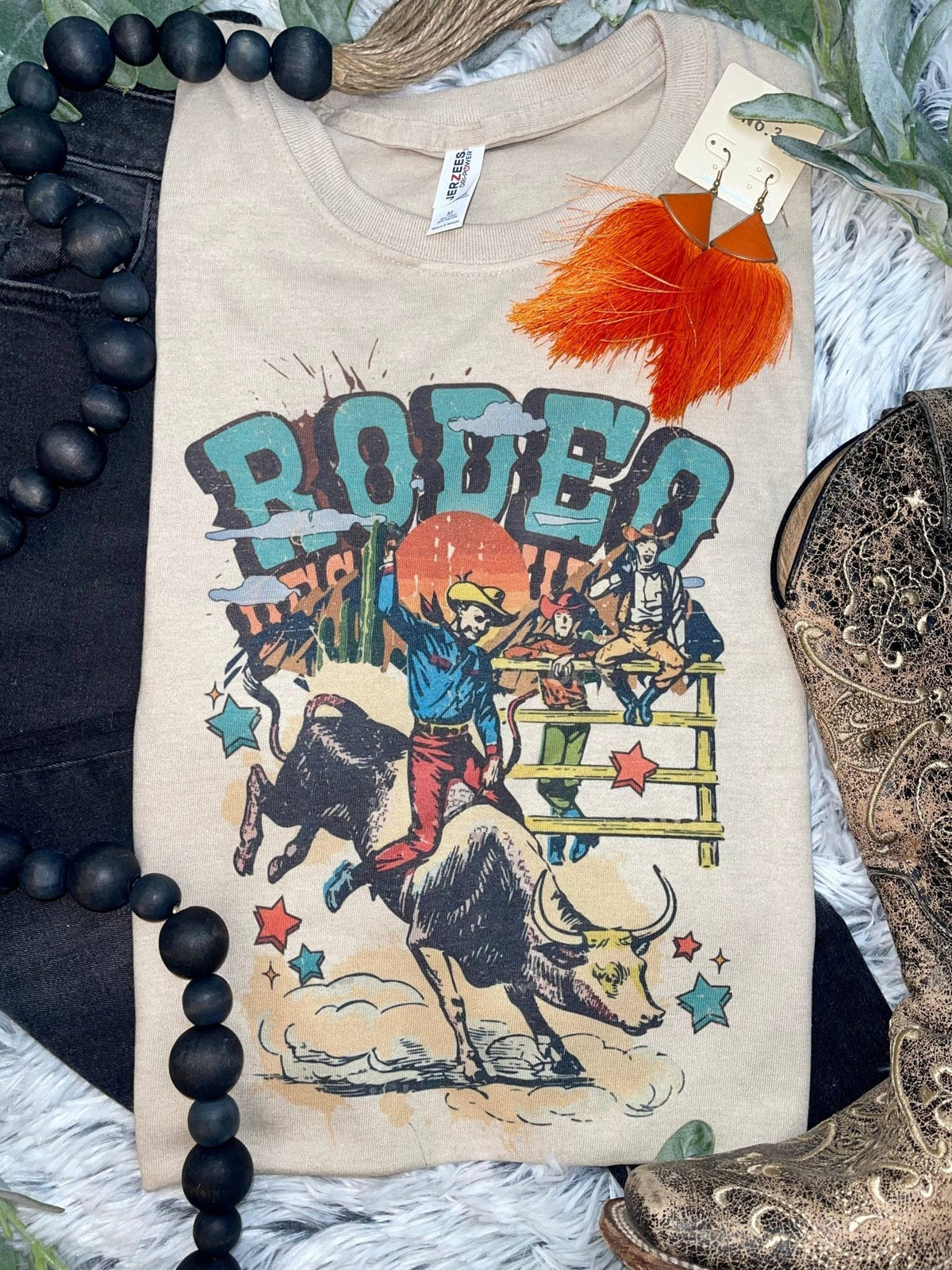 1/2 Penny "Vintage Rodeo Bull Rider" Western Graphic Tee — Sand Cotton-Blend Unisex Western Statement Cowhide and Conchos