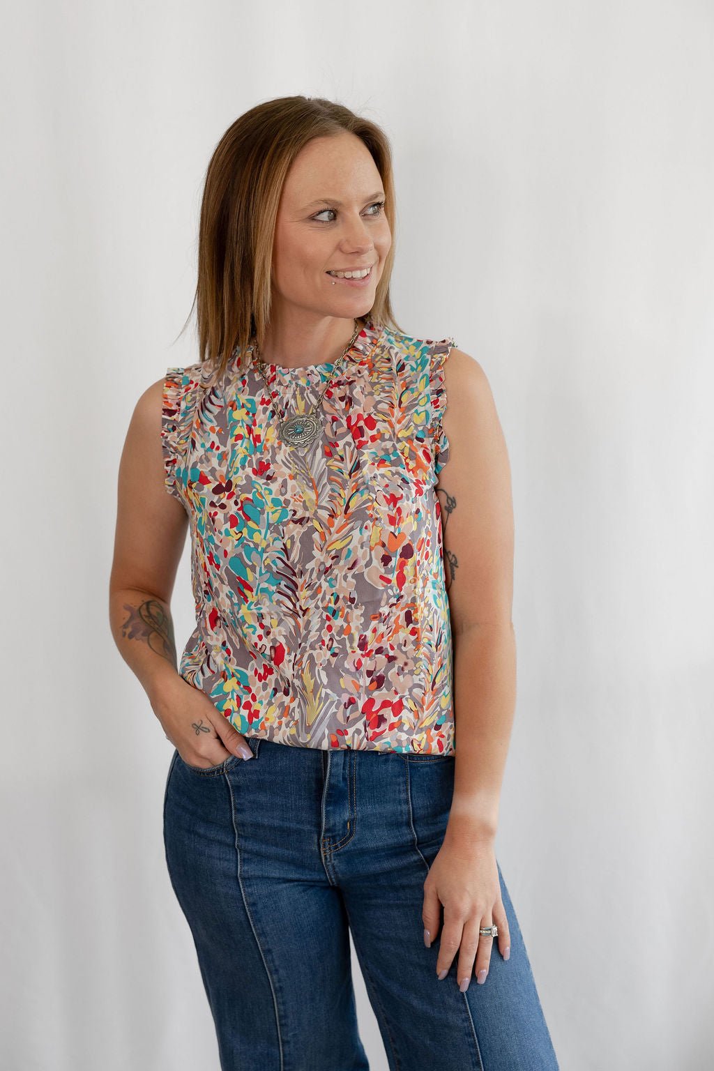 LIME N CHILI Graphic Print Ruffle Mock Neck Sleeveless Western Top — Keyhole Back Detail (Medium remaining) Cowhide and Conchos