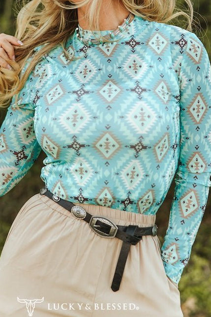 LUCKY & BLESSED Turquoise Aztec Print Long Sleeve Mesh Western Top — Bold Southwestern Geometric Layering Piece Cowhide and Conchos