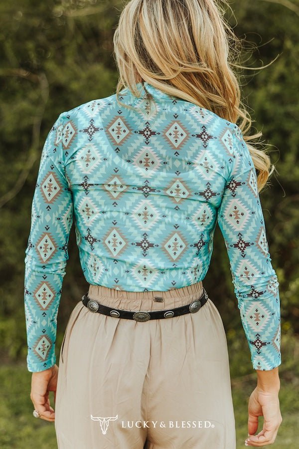 LUCKY & BLESSED Turquoise Aztec Print Long Sleeve Mesh Western Top — Bold Southwestern Geometric Layering Piece Cowhide and Conchos